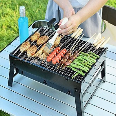 Minigrill mit Platz zum Grillen fuer 4 Personen grillerforumg.de